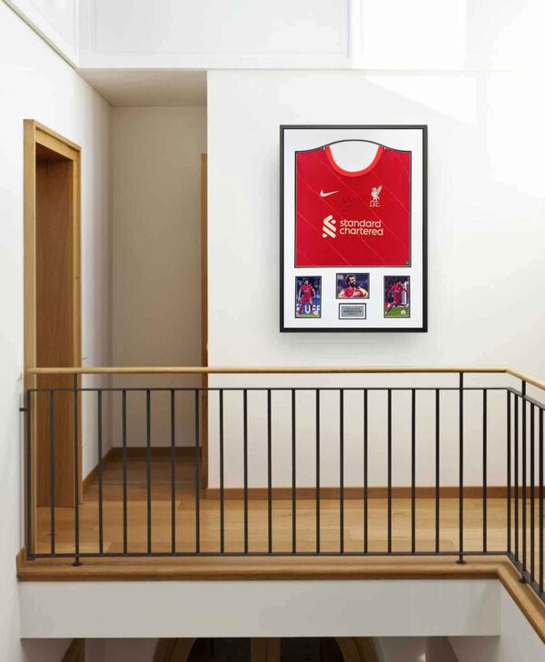 authentically-signed-mo-salah-shirt-on-wall